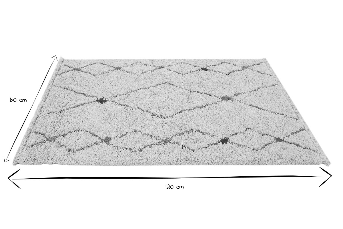 Tapis rectangulaire � motifs losanges, dimensions 60 x 120 cm, en noir et blanc.